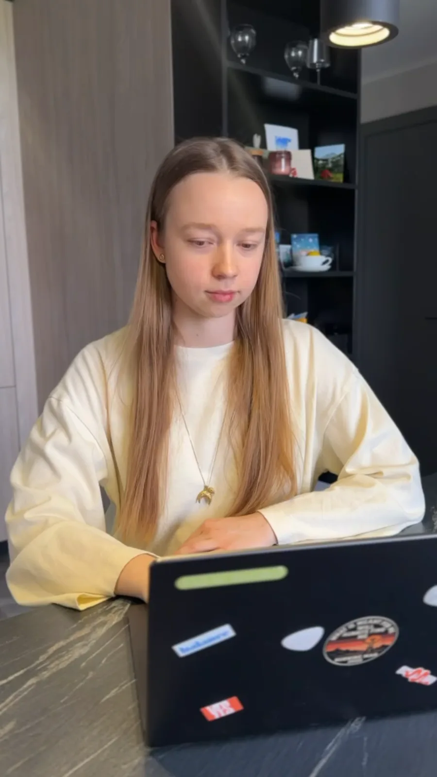 Student studying on a laptop